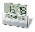 Digital desk weather station with see-through display.