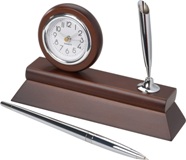 Wooden desk clock with pen holder and chromed ball pen.
